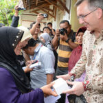 USAID has worked to increase micro credit accessibility. For example, this project in Indonesia provided loans to rural women. https://commons.wikimedia.org/wiki/File:USAID_Micro_Credit_Project.jpg